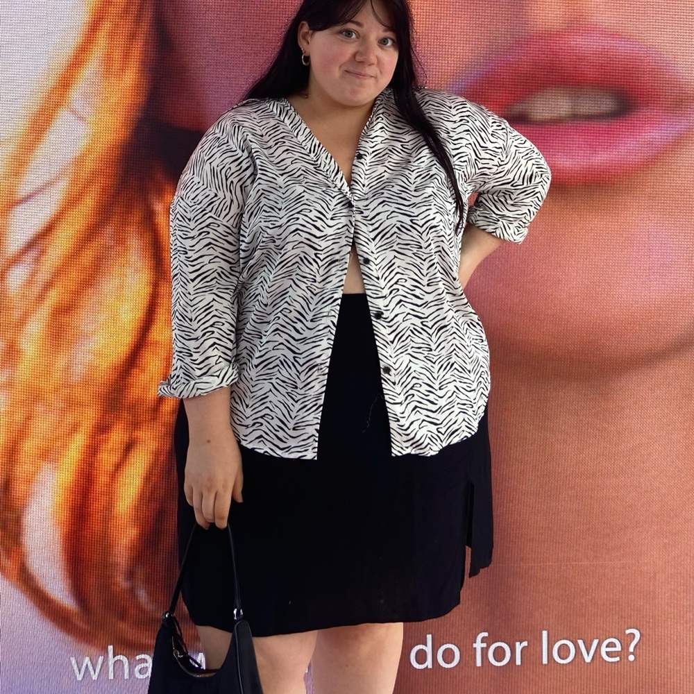 Black reformation mini skirt with side slit, size 22